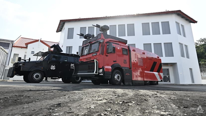 Singapore police unveil new tactical strike vehicles and water cannon fleet