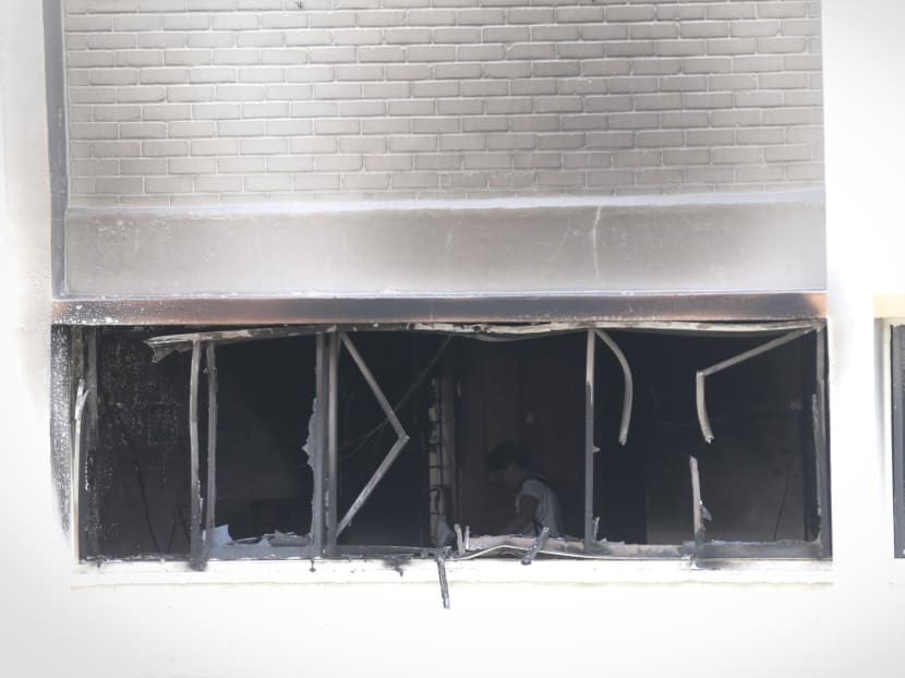 The aftermath of the fire at Marsiling Lane 3 Block 215. Photo: Jason Quah/TODAY