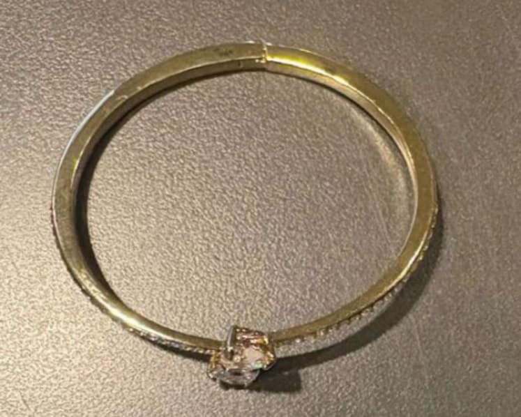 Woman to be charged over alleged theft of Swarovski bracelet at Changi Airport Woman to be charged over alleged theft of Swarovski bracelet at Changi Airport