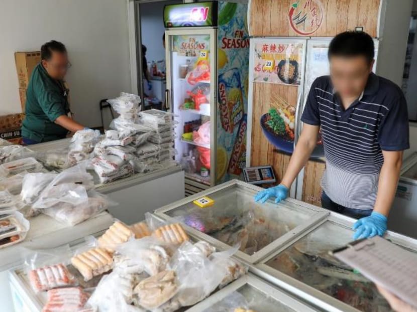 Some of the 700kg of illegally imported meat and seafood products seized by the authorities from an unlicensed storage facility on Senoko Road.