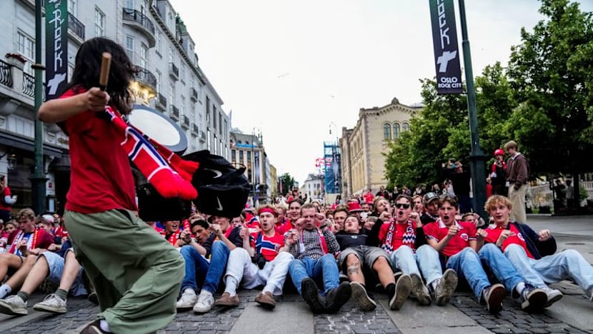 No regrets for no-row Norway fan caught sitting still on TV
