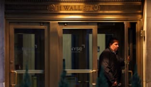 Wall Street ends lower on tariff worry as Fed decision eyed