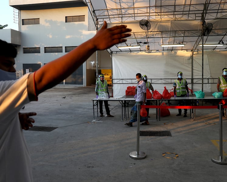 Food-tasting sessions and free Wi-Fi: What inter-agency teams at dorms have done for foreign workers’ well-being