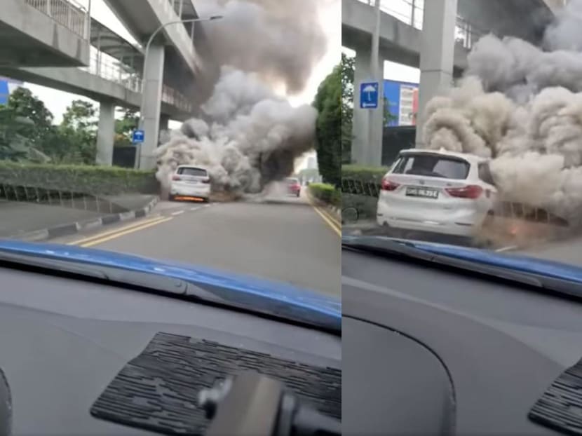 In a video posted on the Singapore Taxi Driver Facebook group, a car on fire can be seen along a slip road, with smoke billowing from its engine.