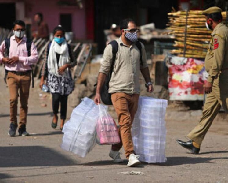 India's daily COVID-19 infections at lowest in 3 months