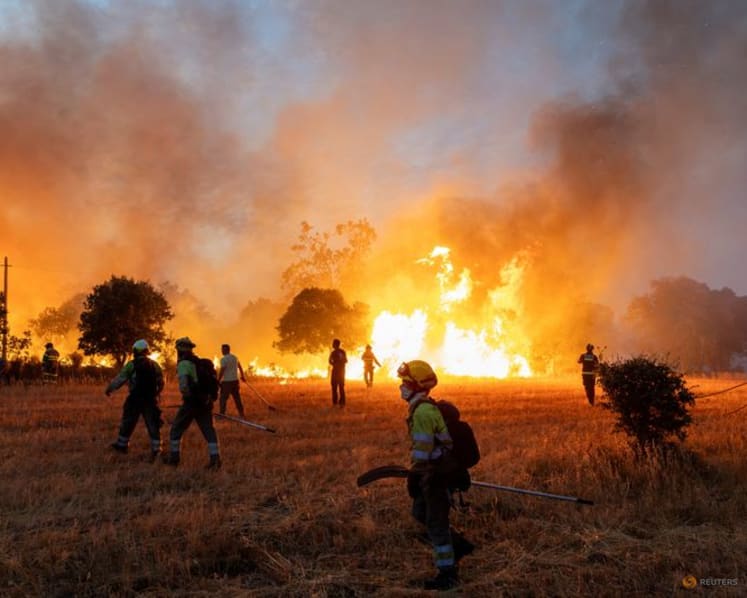 France firefighters hopeful, as Spain ends national emergency