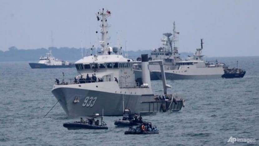 Divers in Indonesia sift through debris, seabed mud for crashed Sriwijaya Air's black boxes