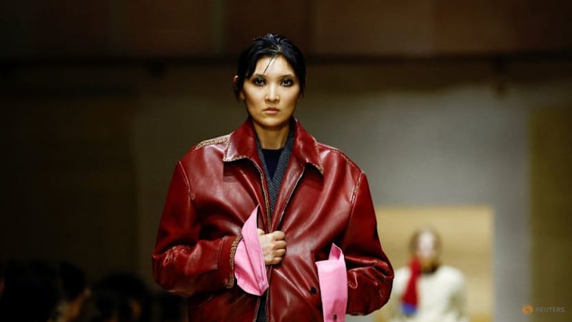 Prada layers winter jackets over light dresses at Milan show as Zuckerberg's presence fuels smart glasses talk