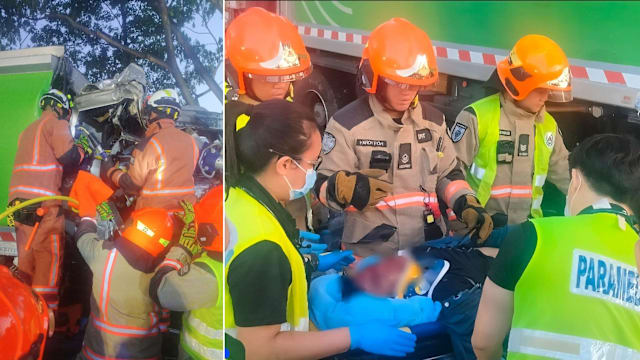 垃圾车疑失控撞树 司机受困车内