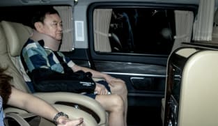 Thailand suspends two doctors over ex-PM Thaksin hospital stay