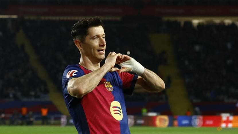 Barcelona edge Rayo to claim top spot with Lewandowski penalty Barcelona edge Rayo to claim top spot with Lewandowski penalty