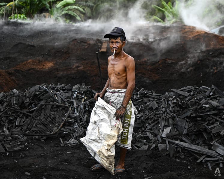 In Pixels: Malaysia's charcoal workers who risk life and health to do the work shunned by most