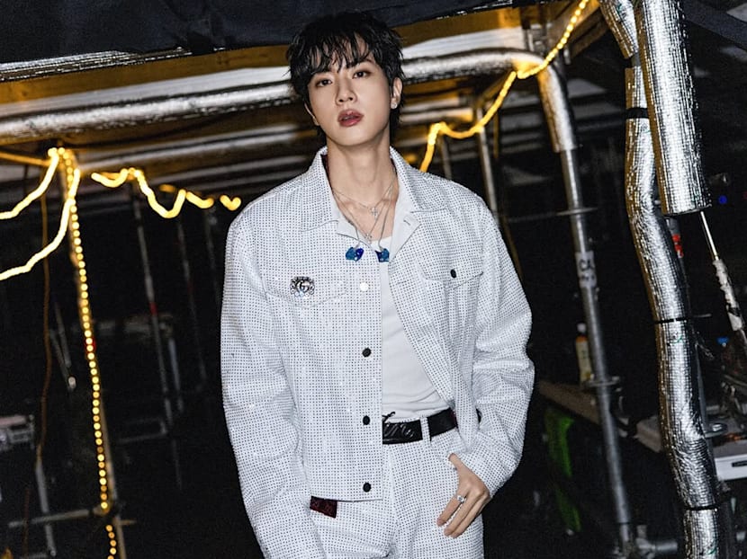 Japanese fan charged with sexual harassment for kissing BTS' Jin at event last year