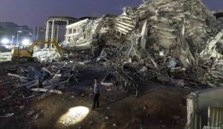 Thai construction magnate surrenders on felony negligence charges over building collapse in quake