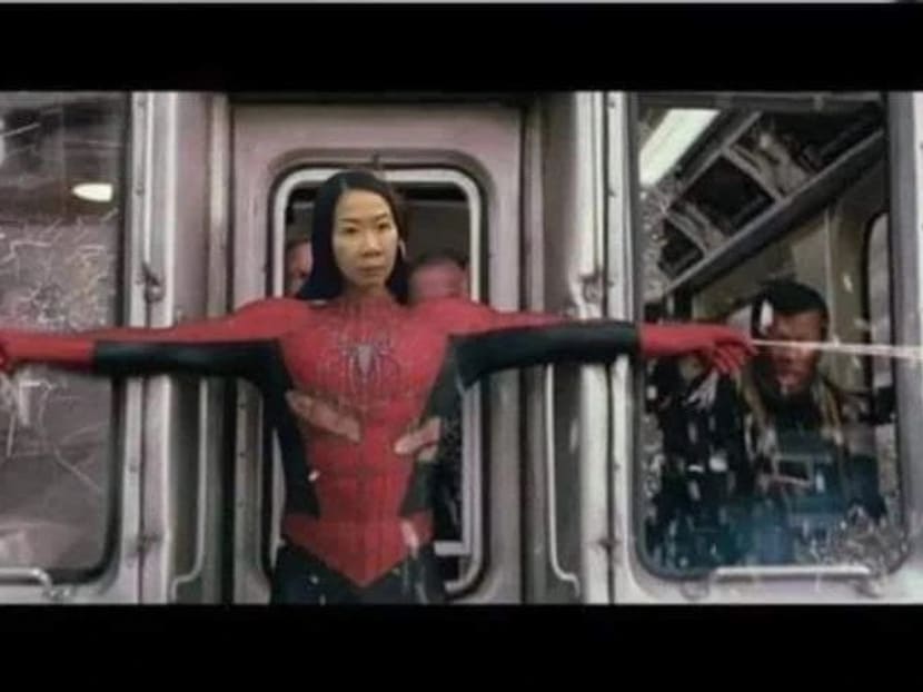 A meme posted by Wake Up Singapore on Instagram, depicting an angry woman who tried to block a car with her body as Spider-Man, in a famous movie sequence where the superhero holds back a subway train. A meme posted by Wake Up Singapore on Instagram, depicting an angry woman who tried to block a car with her body as Spider-Man, in a famous movie sequence where the superhero holds back a subway train.