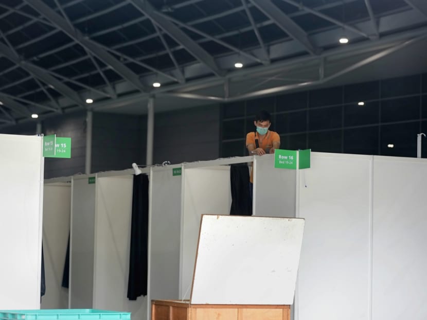 Contractors at the Singapore Expo preparing the halls to be used as a community care facility on April 9, 2020. Contractors at the Singapore Expo preparing the halls to be used as a community care facility on April 9, 2020.