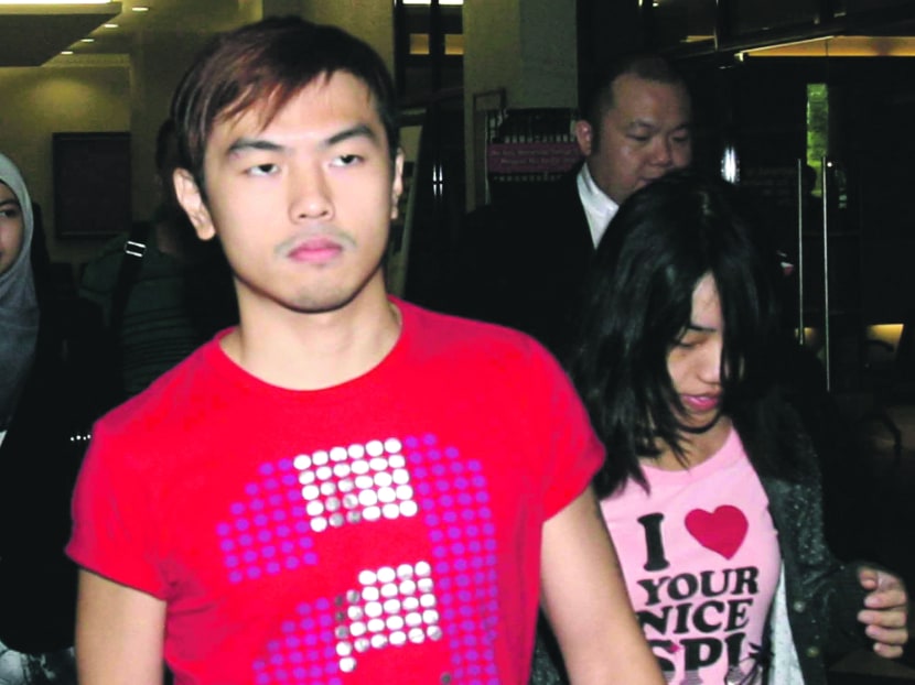 File photo of Alvin Tan (left) with ex-girlfriend Vivian Lee walking outside a courthouse in Kuala Lumpur last year. Photo: AP