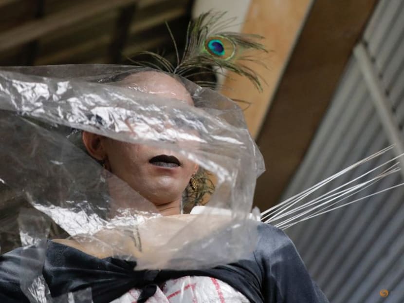 Indonesian transgender models shine spotlight on pollution with plastic fashion