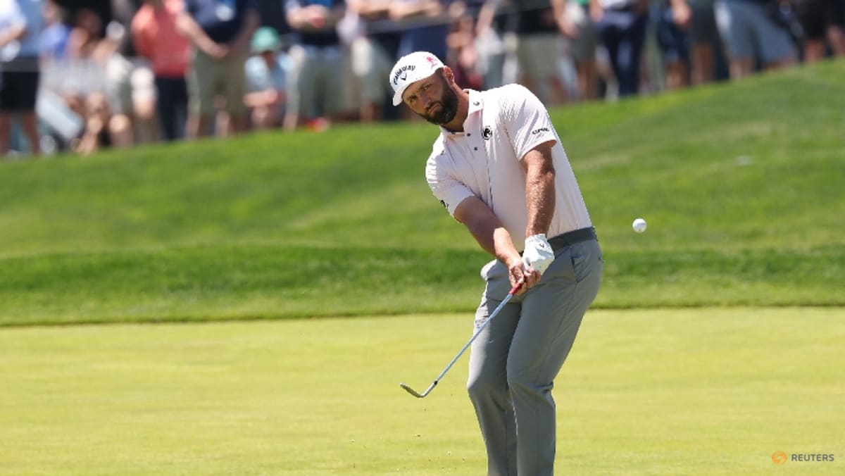 Rahm puts LIV spotlight aside after surging into PGA contention