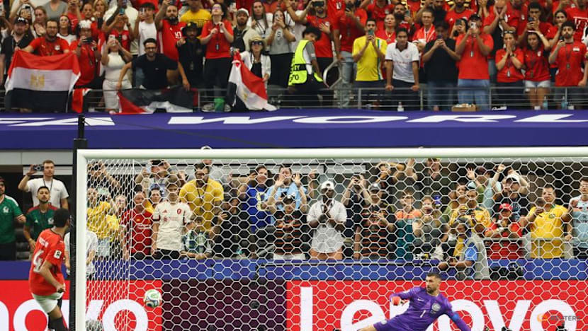 Egypt hold nerve to sink Australia on penalties and reach World Cup round of 16