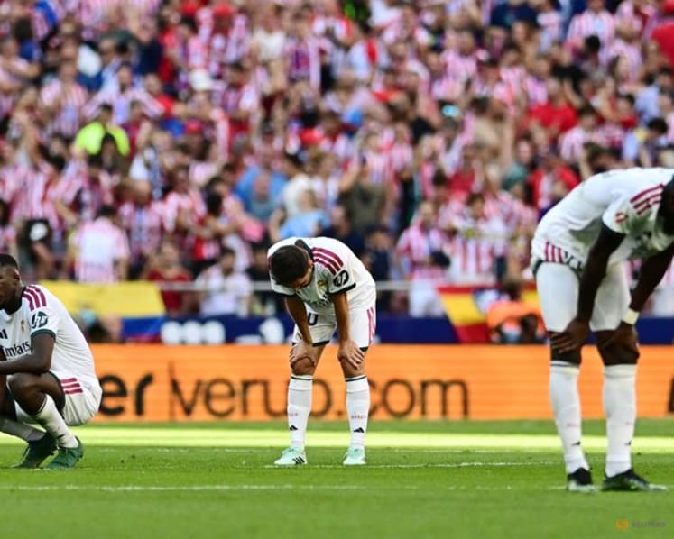 Atletico ride derby storm to beat 10-man Real Madrid 2-1