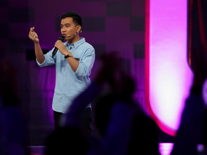 Vice presidential candidate Gibran Rakabuming Raka gestures during a televised debate at the Jakarta Convention Center in Jakarta, Indonesia, on Dec 22, 2023. 