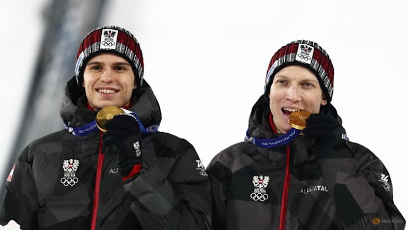 Ski jumping-Austria prevail in chaotic super team final disrupted by snow