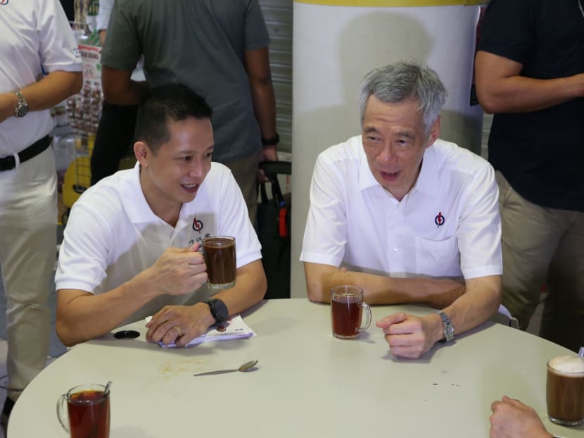 Mr Lee Hsien Loong (right) and Mr Yip Hon Weng (left) did not address the media, but sat down together to chat about the new candidate’s campaign so far, talking over coffee and tea served by one of the stalls. Mr Lee Hsien Loong (right) and Mr Yip Hon Weng (left) did not address the media, but sat down together to chat about the new candidate’s campaign so far, talking over coffee and tea served by one of the stalls.