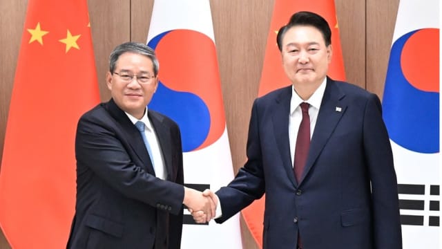 中韩同意在适当时举行高层战略对话