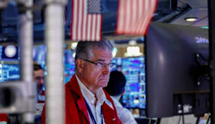Stocks boosted by tech earnings; bond yields hit multi-year highs