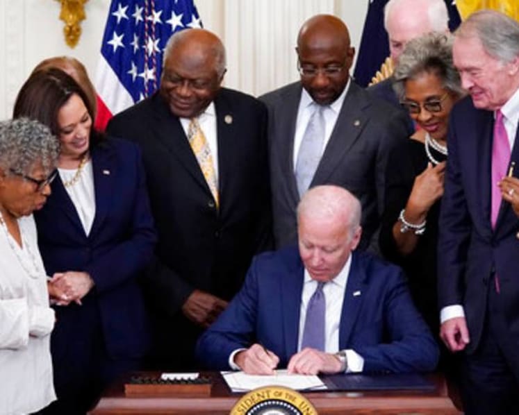 Biden signs Bill making Juneteenth a federal holiday