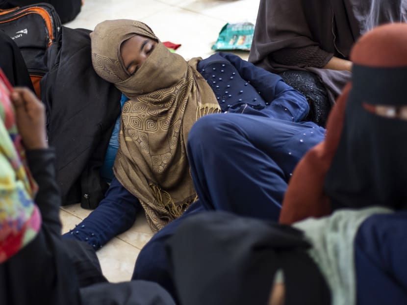 More than 100 Rohingya land on beach in Indonesia's Aceh