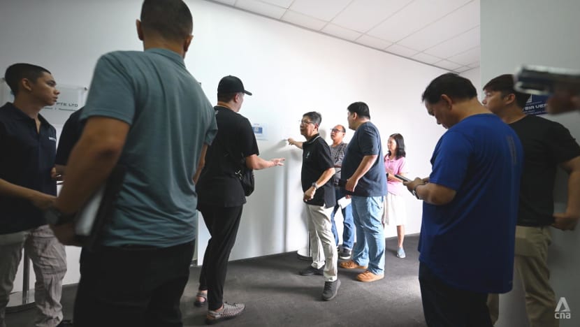 Tempers frayed, voices raised at Woodlands VEP centre as Oct 1 deadline nears Tempers frayed, voices raised at Woodlands VEP centre as Oct 1 deadline nears