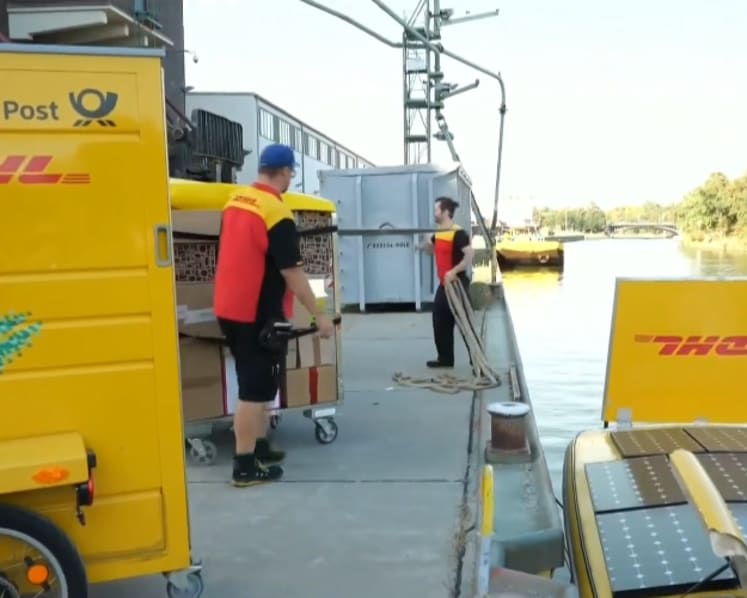 German delivery firms drive green transition with solar-powered boats and e-bikes