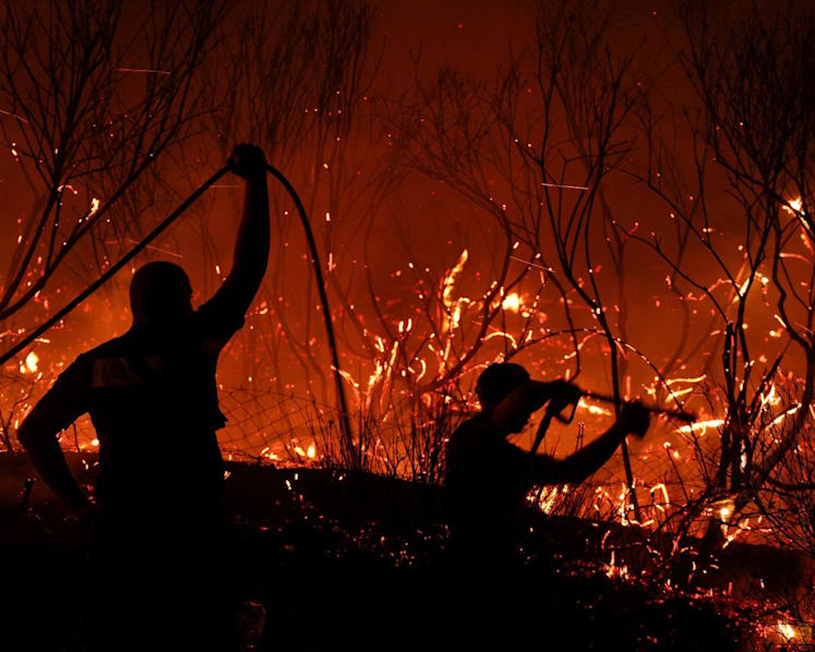 Wildfires kill three across southern Europe, force thousands to evacuate