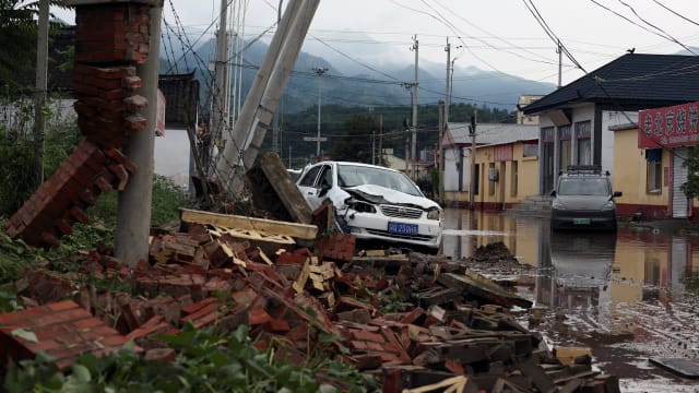 北京河北暴雨成灾酿30多死 当局启动四级救灾应急响应
