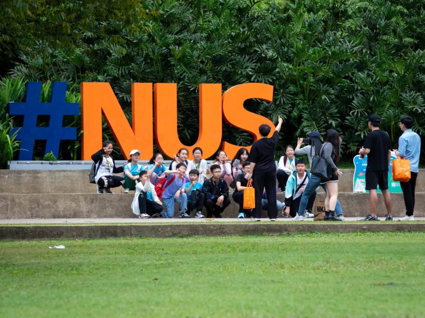 Tourists taking photos at the National University of Singapore on Jan 31, 2024