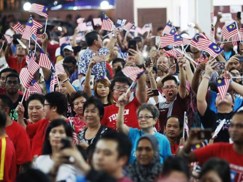 What are the political calculations behind move to lower the voting age in Malaysia?