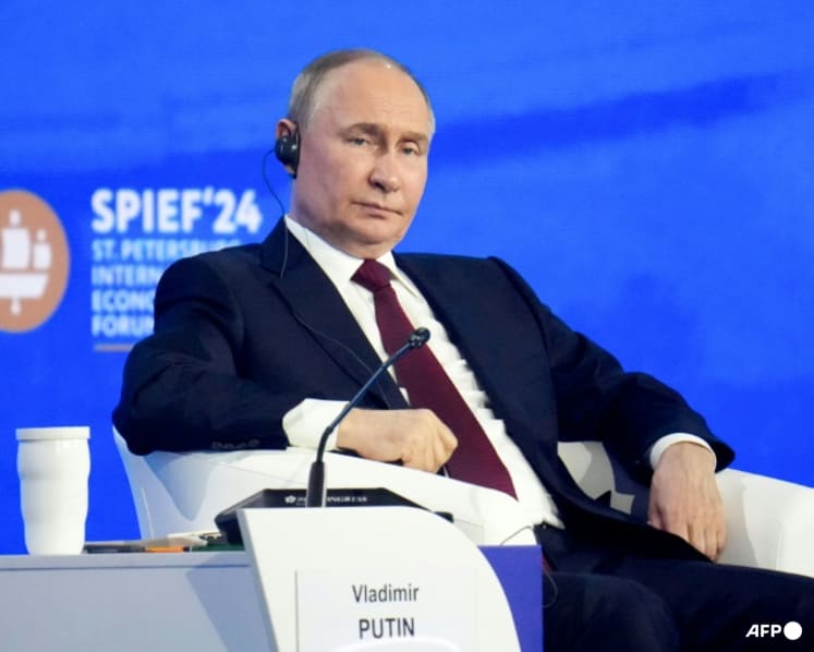 Putin says Russia's economy is growing despite international sanctions