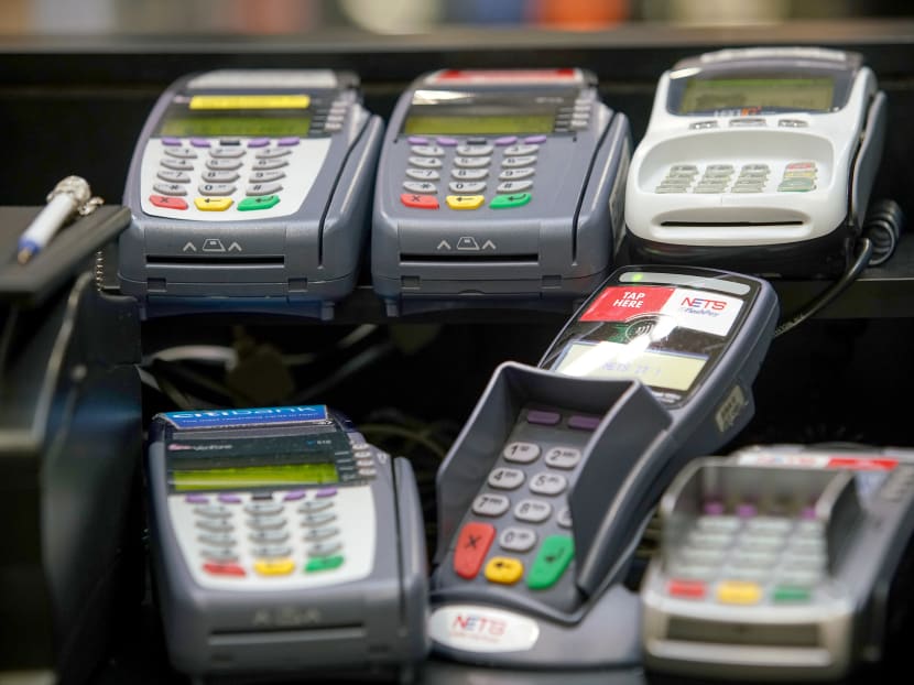 Even though Singapore has e-payment platforms as well, the various different schemes and systems have caused inconvenience for consumers and incurred costs for businesses. Photo: Ministry of Communications and Information