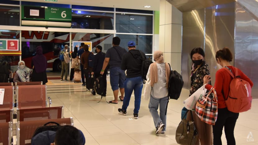 'Even if it's for just one day': Some Malaysians return home to meet family on first day of interstate travel