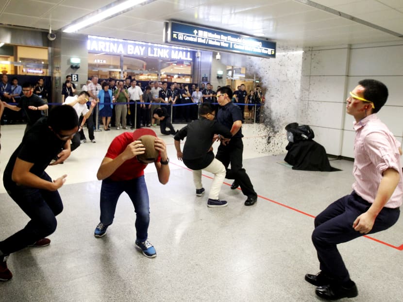 Police conduct anti-terror exercises at Dhoby Ghaut, Downtown MRT stations