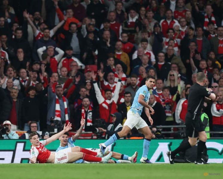 Man City cut Arsenal down to size as O'Reilly double seals League Cup final
