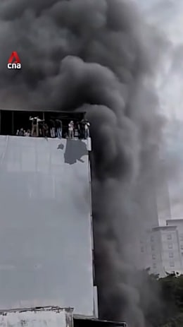 Jakarta building fire kills at least 20; more trapped inside