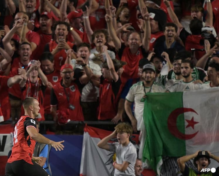 Austria draw with Algeria in World Cup thriller to progress and send Iran home