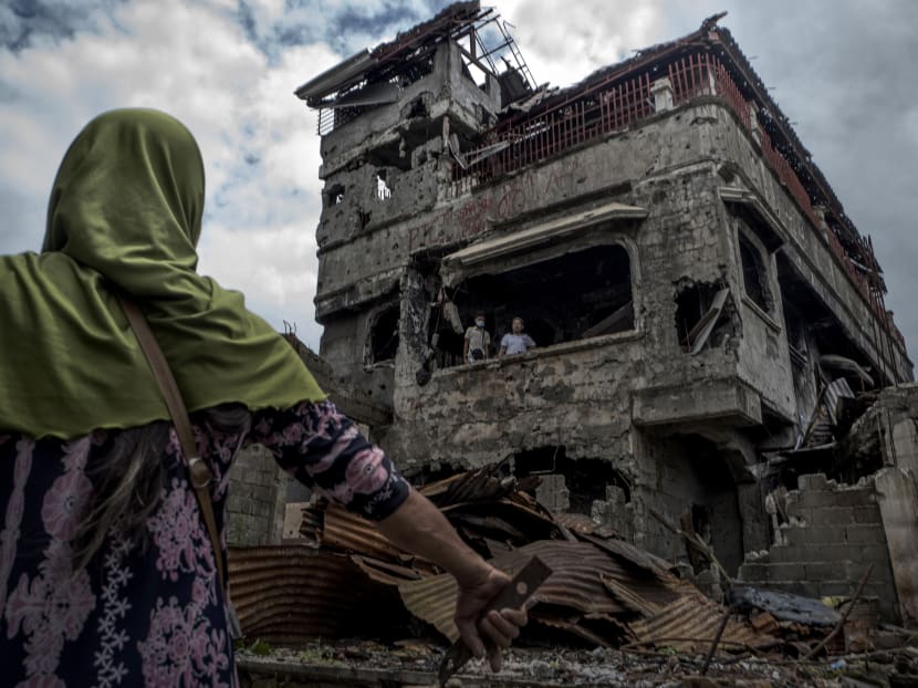 Residents examining the wreckage of their home in Marawi, in the southern Philippines. The author says the siege of Marawi underscored the fact that South-east Asia was unprepared for the current and emerging wave of terrorism and demonstrated the need for new security architecture for the region. Residents examining the wreckage of their home in Marawi, in the southern Philippines. The author says the siege of Marawi underscored the fact that South-east Asia was unprepared for the current and emerging wave of terrorism and demonstrated the need for new security architecture for the region.