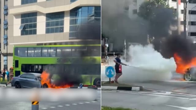 马路中央起火燃烧 轿车车头烧成废铁