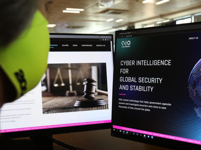 A woman checks the website of Israel-made Pegasus spyware at an office in the Cypriot capital Nicosia on July 21, 2021.