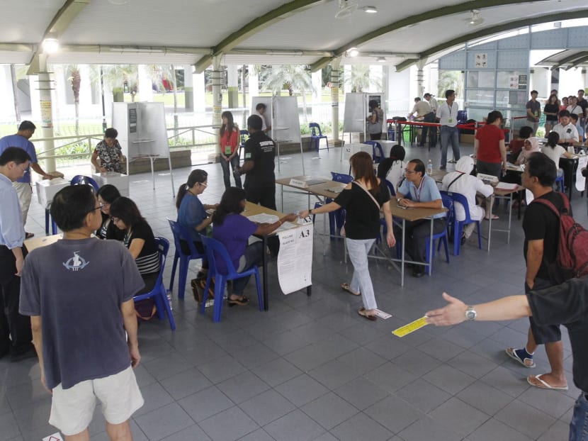 Punggol East residents voting for their Member of Parliament on Jan 26, 2013. Photo: Ernest Chua