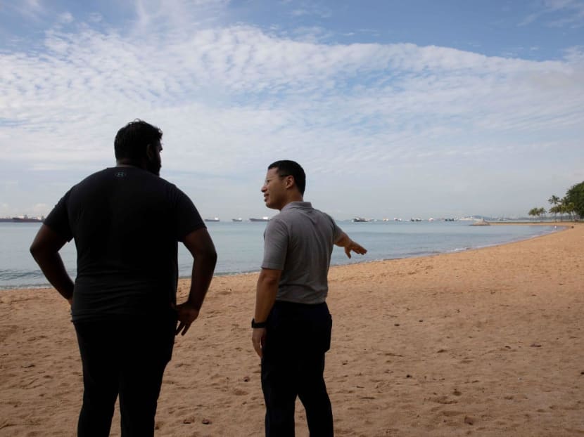 National Development Minister Desmond Lee (right) at East Coast Park on Nov 28, 2023, looking at the suggested location for "Long Island", a large area of reclaimed land that is being proposed for the future. National Development Minister Desmond Lee (right) at East Coast Park on Nov 28, 2023, looking at the suggested location for "Long Island", a large area of reclaimed land that is being proposed for the future.